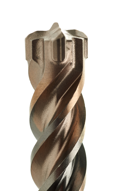 Närbild på borrhuvud med spiralformade skär, anpassat för hammarborrning.