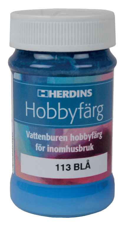 Blå flaska med etikett som lyder "HERDINS Hobbyfärg, Vattenburen hobbyfärg för inomhusbruk, 113 BLÅ", vitt lock upptill.
