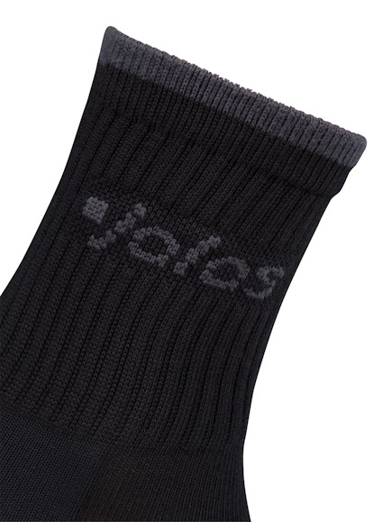 Svart stickad strumpa med grå mudd och texten "yobos" i ljusare grått vid skaftet.