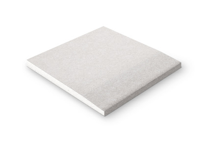 Gipsskiva i ljusgrått med jämn yta, placerad på en mörk kant.