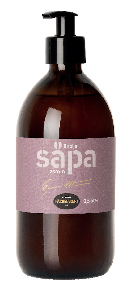 Brun flaska med pump, etikett med texten "linolje såpa jasmin" och "0,5 liter".