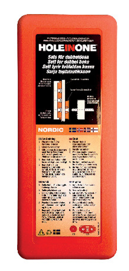 Orange förpackning med etikett "Hole in One" och instruktioner på svenska, norska och finska.