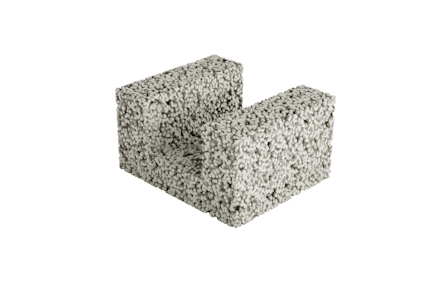 Betongblock i form av ett "U", med grov textur och synliga stenar.